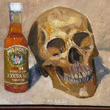 Load image into Gallery viewer, Close-up of the painted skull, hot sauce bottle, and artist signature.