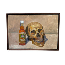 Load image into Gallery viewer, Framed still life painting of a skull and hot sauce bottle.