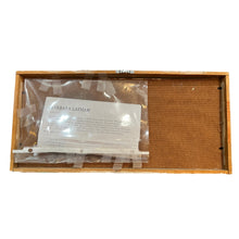Load image into Gallery viewer, View of reverse of Barbara Latham painting showing back of frame and attached insert.