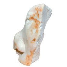 Load image into Gallery viewer, Rear angled view of sculpture showing form emerging from raw stone.