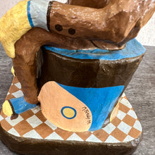Load image into Gallery viewer, Side and base detail showing artist signature and painted elements.