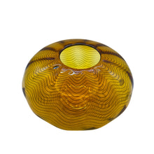 Load image into Gallery viewer, Top view of amber art glass vase by Sam Stang showing circular opening and intricate black line pattern.