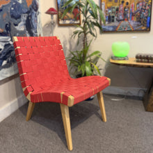 Load image into Gallery viewer, Signed Knoll Jens Risom lounge chair displayed in a gallery setting with artwork and modern décor.
