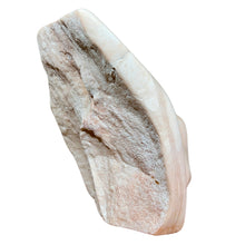 Load image into Gallery viewer, Back of sculpture showing unpolished stone surface and natural texture.
