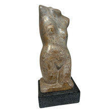 Load image into Gallery viewer, Side view of stone female torso sculpture by Chris MacAndrew showing curved form and surface texture.
