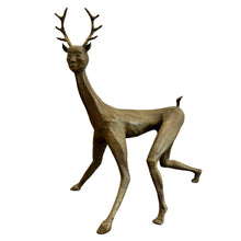 Load image into Gallery viewer, Bronze sculpture of a being with deer-like antlers and a human body.
