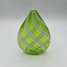 Load image into Gallery viewer, Green striped glass vase by Jeffrey P’an displayed in an interior setting on a surface with surrounding decor.

