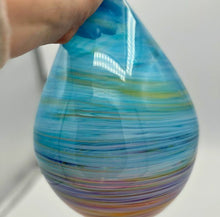 Load image into Gallery viewer, Nao Yamamoto Unicorn Cloud glass sculpture held in hand, showing scale and layered multicolor banding.
