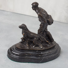 Load image into Gallery viewer, Three-quarter view of bronze hunter and dog, showing composition and sculptural form.
