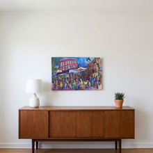 Load image into Gallery viewer, Computer-generated illustration: Randy Smith oil painting Tom Tom Fest 2022 hanging on a white wall above a wooden sideboard
