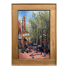 Load image into Gallery viewer, Colorful pointillist-style painting by Randy Smith depicting Charlottesville’s Downtown Mall with the Paramount Theater marquee displaying “Earth Day,” outdoor café umbrellas, pedestrians, and tree-lined streets framed in natural wood.
